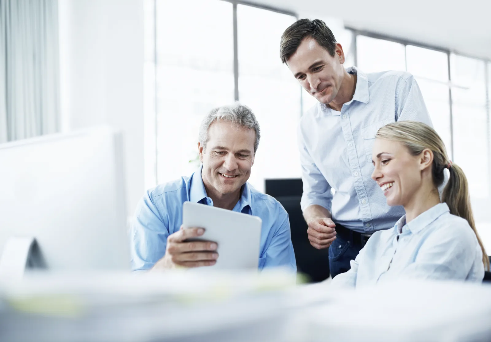 Professional business scene — Enrollment Tablet Review — benefits administration context