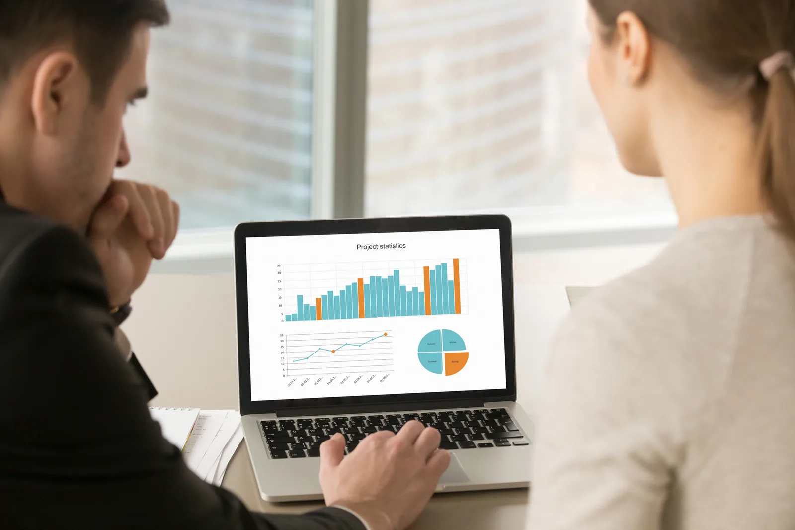Professional business scene — Reporting Computer Screen Graph — benefits administration context